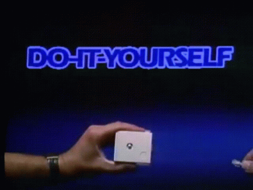 A Blue Sign That Says Do It Yourself Its A Snap GIF