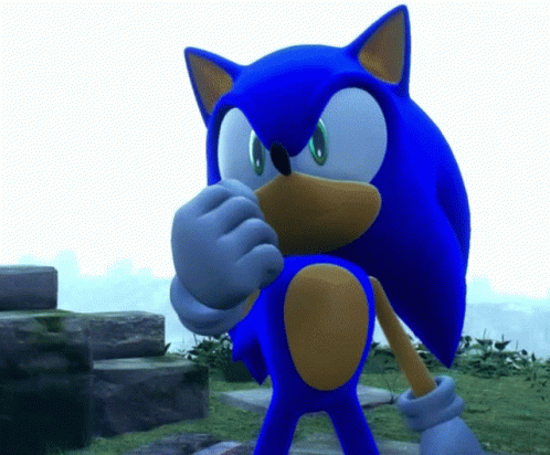 A Blue Sonic The Hedgehog Is Standing In A Grassy Area GIF