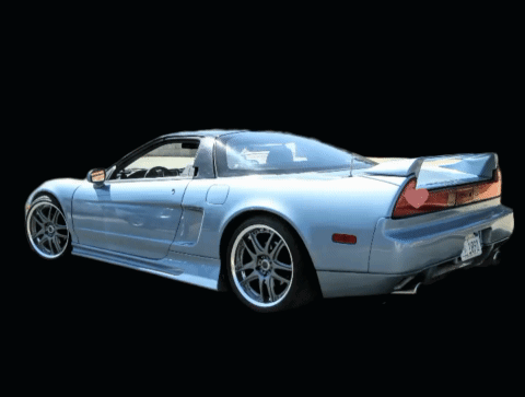 A Blue Sports Car With A License Plate That Says Jrb GIF