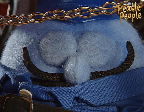 A Blue Stuffed Animal With The Words Treacle People On It GIF