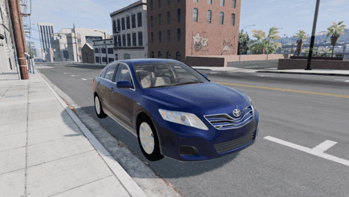 A Blue Toyota Car Is Parked On The Side Of The Street GIF