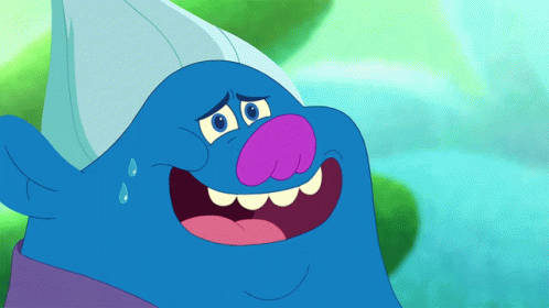 A Blue Troll With A Purple Nose And A White Hat Is Smiling GIF