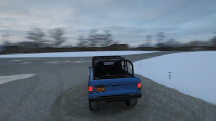 A Blue Truck Is Driving Down A Snowy Road With A New York License Plate GIF