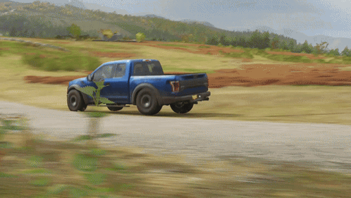 A Blue Truck With The Word Raptor On The Back GIF