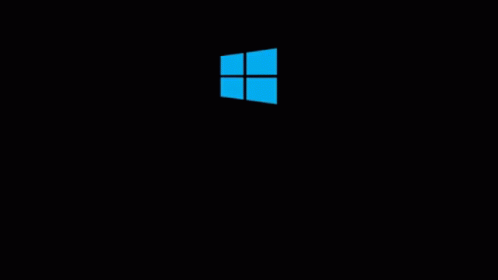 A Blue Windows Logo Is Displayed On A Black Background . GIF