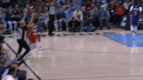 A Blurred Image Of A Basketball Game With The Word Rays In The Background GIF