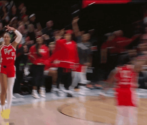 A Blurred Image Of A Basketball Player Wearing A Jersey That Says Las Vegas GIF