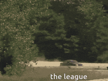 A Blurred Image Of A Boat In The Water With The Words The League Above It GIF