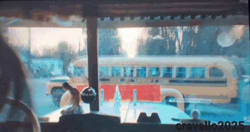 A Blurred Image Of A Bus With The Year 2025 On The Bottom GIF