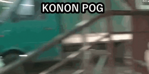 A Blurred Image Of A Car With The Words Konon Pog On The Bottom GIF