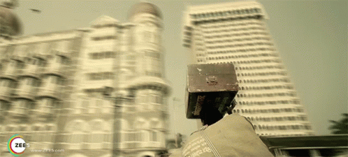 A Blurred Image Of A City With The Word Zee On The Bottom Right GIF