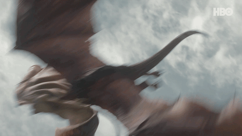 A Blurred Image Of A Dragon With A Hbo Logo In The Background GIF