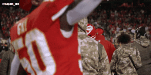 A Blurred Image Of A Football Player With The Number 50 On His Jersey GIF