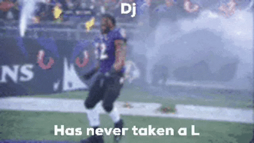 A Blurred Image Of A Football Player With The Words " Dj Has Never Taken A L " GIF