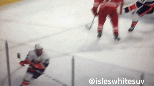 A Blurred Image Of A Hockey Game With The Words @Isleswhitesuv At The Bottom GIF