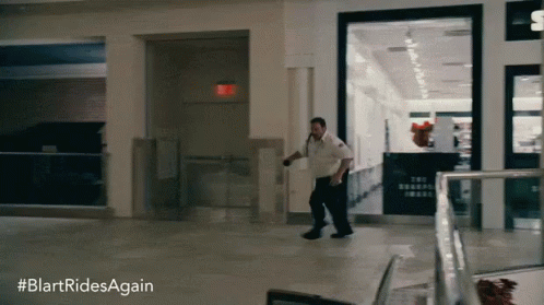 A Blurred Image Of A Man Running In A Mall With The Hashtag #Blartridesagain GIF
