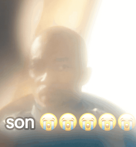 a blurred image of a man with tears on his face and the words son below him