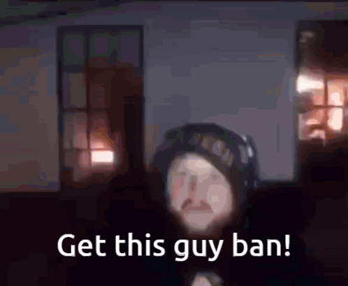 A Blurred Image Of A Man With The Words Get This Guy Ban Written Below Him GIF