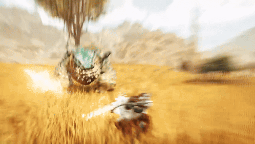 A Blurred Image Of A Person Fighting A Monster In A Field GIF