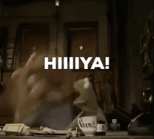 A Blurred Image Of A Person In A Kitchen With The Words Hiiiiiiya Written On It GIF