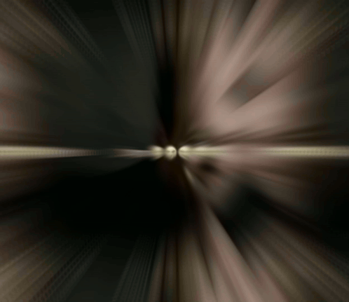 A Blurred Image Of A Person 'S Face With A Light Coming Out Of The Middle GIF