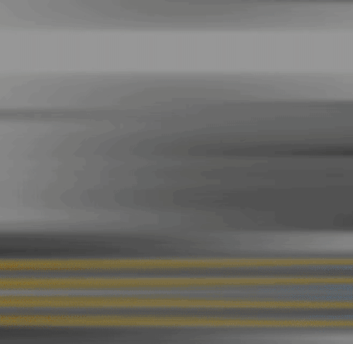 A Blurred Image Of A Person 'S Face With A Yellow Line Behind It GIF