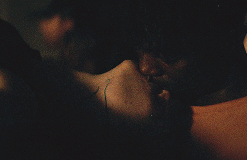 A Blurred Image Of A Person 'S Neck And Shoulder GIF