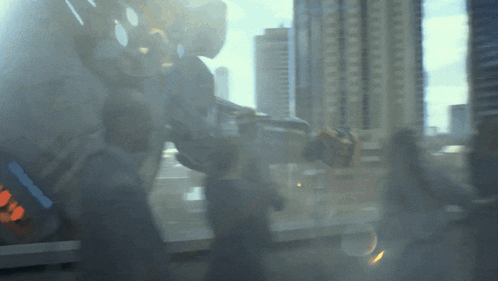 A Blurred Image Of A Person Standing In Front Of A Window GIF