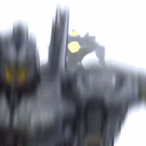 A Blurred Image Of A Person Standing On A Ledge GIF