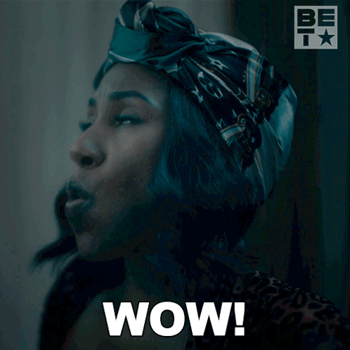 A Blurred Image Of A Person Wearing A Hat With The Words Wow Written In White GIF
