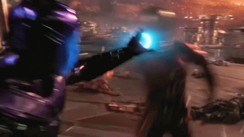 A Blurred Image Of A Person With A Blue Light Coming Out Of Their Chest GIF