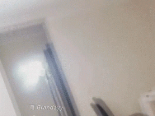 A Blurred Image Of A Person With The Word Grandayy Written In The Corner GIF