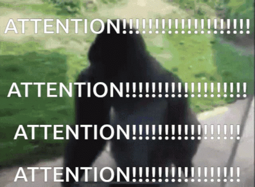A Blurred Image Of A Person With The Words " Attention " Written On It GIF