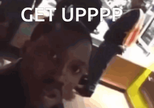 A Blurred Image Of A Person With The Words Get Upppp Written On The Bottom GIF