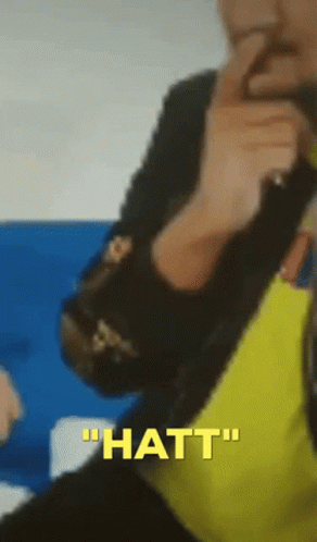A Blurred Image Of A Person With The Words " Hatt " On The Bottom Right GIF