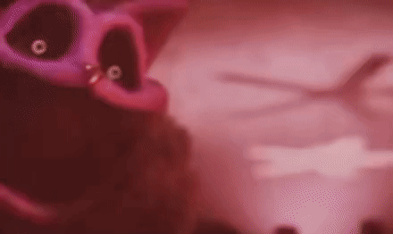 A Blurred Image Of A Pig With A Purple Head And A Purple Nose . GIF