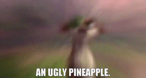 A Blurred Image Of A Pineapple With The Words `` An Ugly Pineapple '' Written Above It . GIF