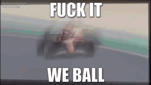 a blurred image of a race car with the words fuck it we ball