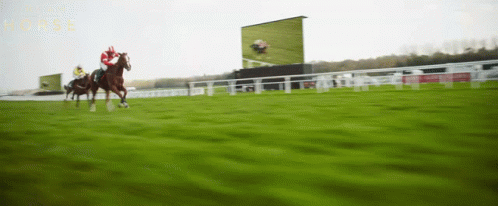 A Blurred Image Of A Race Track With The Word Horse On The Bottom GIF