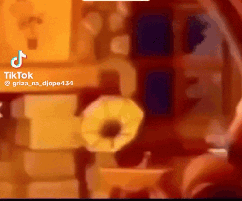 A Blurred Image Of A Room With A Tiktok Logo On Top GIF