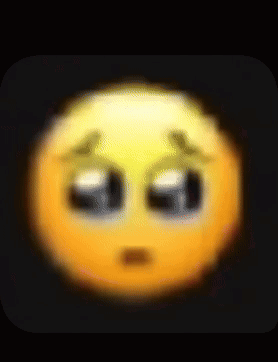 A Blurred Image Of A Sad Smiley Face With Tears Coming Out Of Its Eyes . GIF