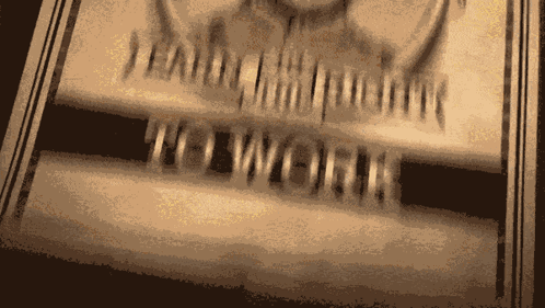 A Blurred Image Of A Sign That Says " Learn How To Work " On It GIF