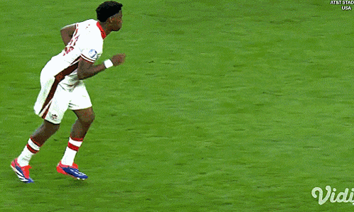 A Blurred Image Of A Soccer Field With The Words At & T Stad Usa On The Bottom Right GIF