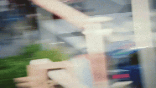 a blurred image of a staircase in a building