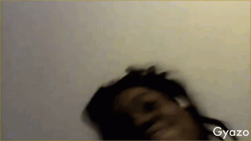 A Blurred Image Of A Woman With Gyazo Written On The Bottom Right Corner GIF