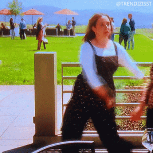 A Blurred Image Of A Woman With The Hashtag Trendizisst On The Bottom Right GIF