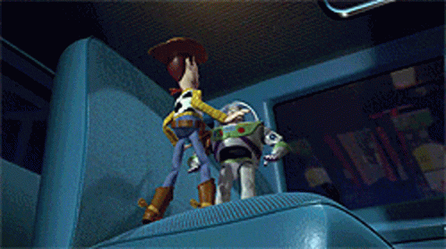 a blurred image of buzz lightyear reaching for something