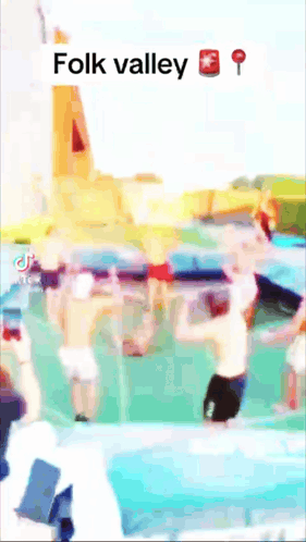 A Blurred Image Of People In A Pool With The Words Folk Valley At The Bottom GIF