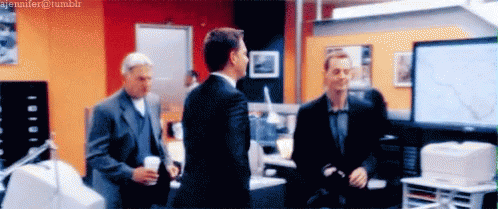 A Blurred Image Of Three Men Standing In An Office With The Hashtag Jennifer @ Tumblr At The Bottom GIF