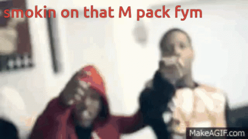 A Blurred Image Of Two People With The Words Smokin On That M Pack Fym GIF